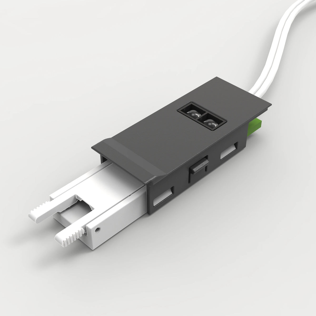 A close-up of a dark gray electronic component or connector with a white cable extending from the top right and a white metal bracket on the left, shown on a light gray background. #Finish_Black